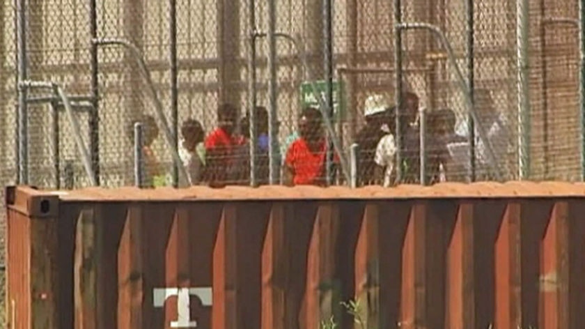 TV still of Christmas Island detainees.