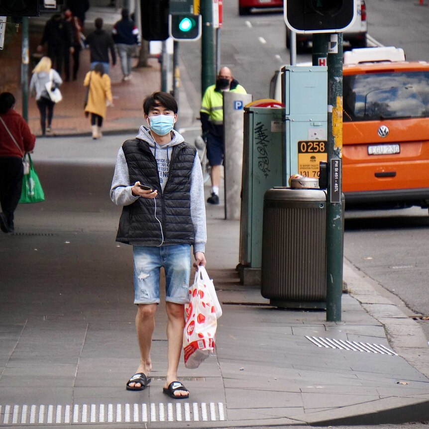 A lone pedestrian during Sydney lockdown.