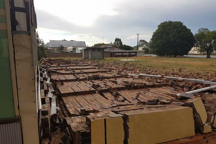 A wall of a property came down at Clifton, south of Toowoomba, during the storms.