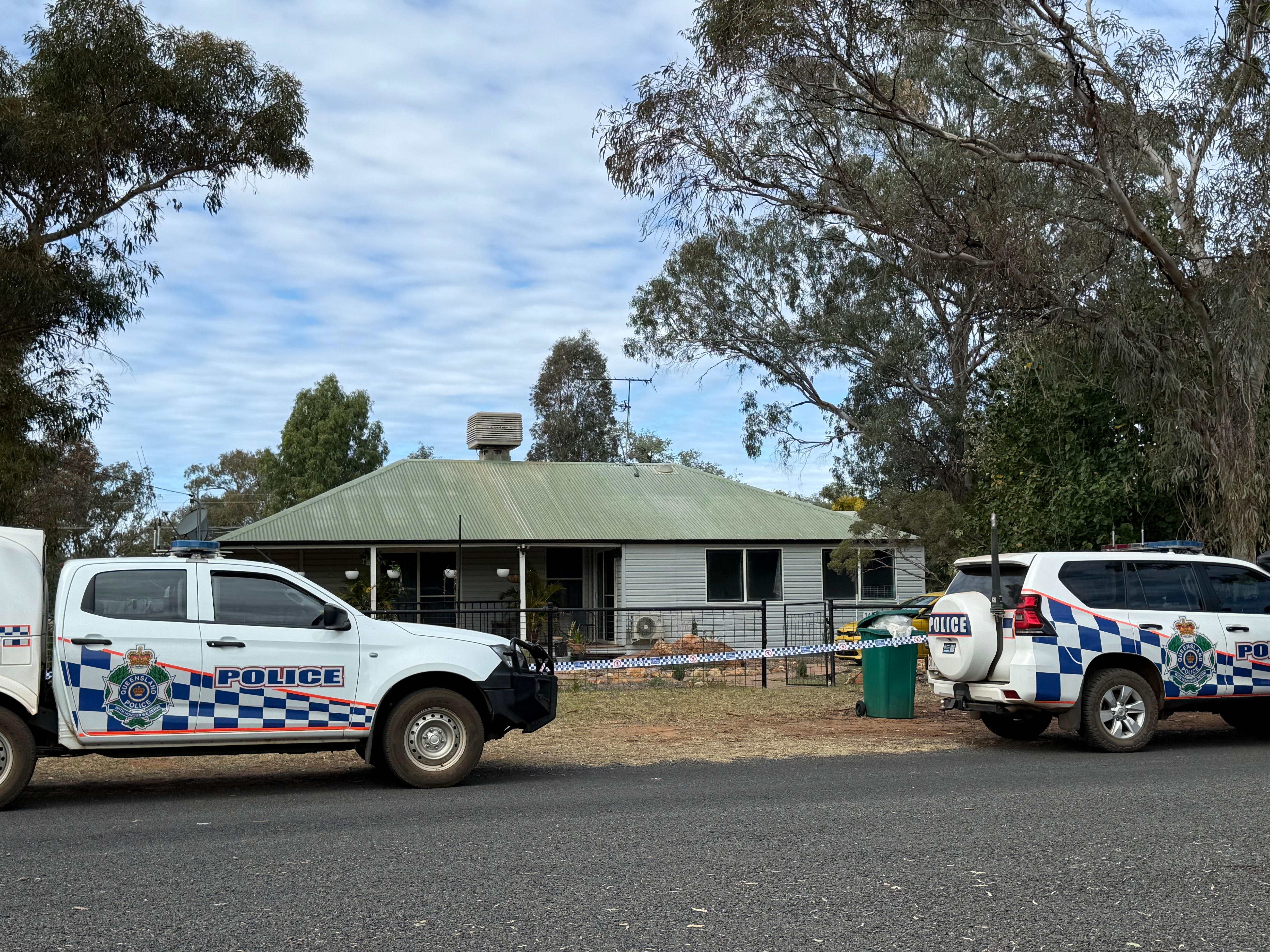 Police outside an outback Queensland home.