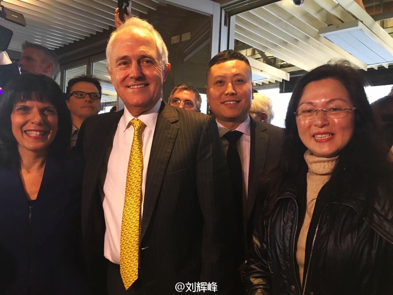Mr Haha Liu stands behind Julia Banks, Malcolm Turnbull and Gladys Liu in 2016.