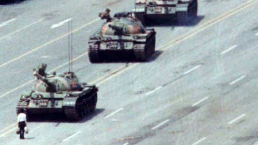 Tanks roll through Tiananmen Square on June 4, 1989, the day of the massacre (Photo: Reuters/Arthur Tsang)