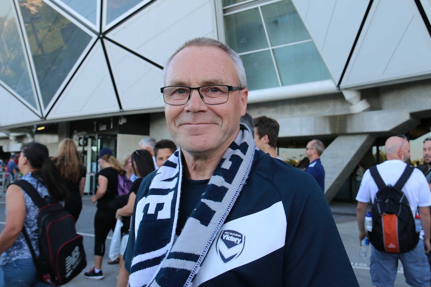 Melbourne Victory fan John Jones outside Melbourne's rectangle stadium.