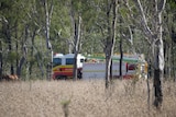 A fire truck in bushland.