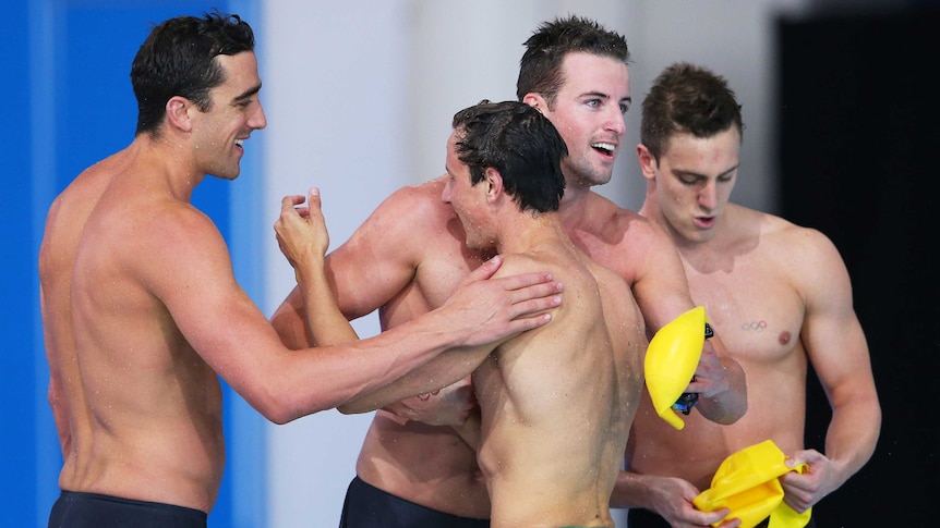 Australia's 4x100m freestyle relay team celebrates after winning gold in Glasgow.