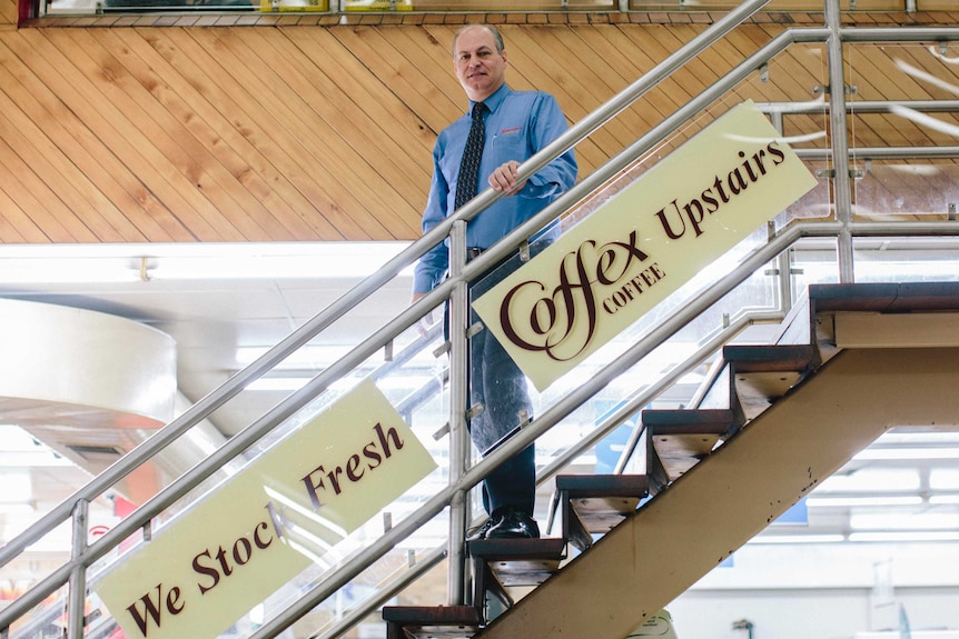 Joe Piedimonte Jnr standing on the supermarket stairs