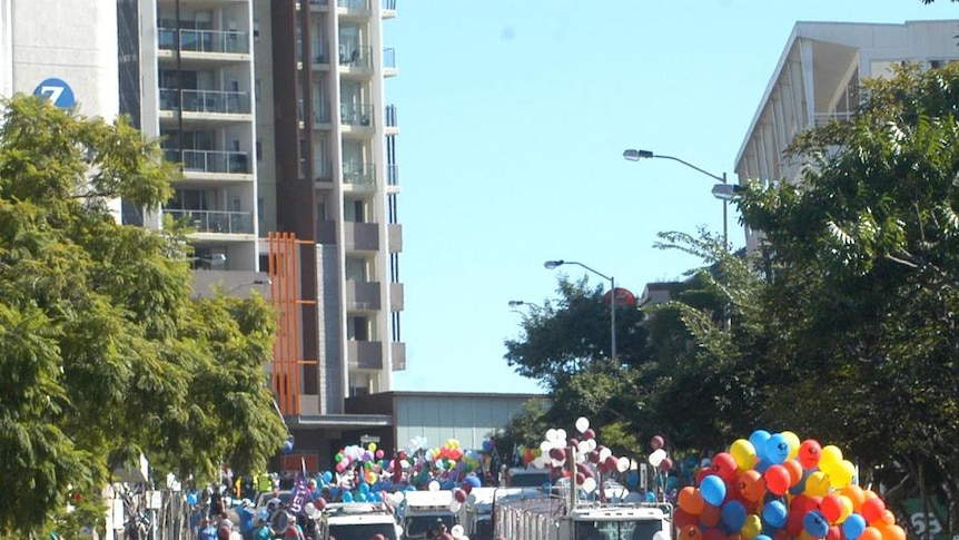 Labour Day marchers make their way down Wharf Street in Brisbane's CBD.