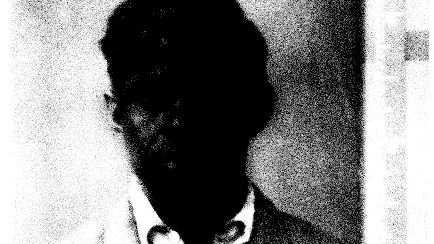 A historical portrait of a man's face to obscured, making it difficult to identify his facial features.