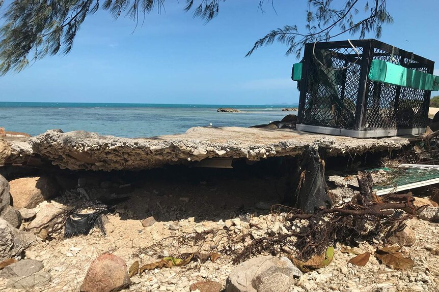 Seawater erosion under the top of the existing seawall at Maubiag Point on Yam Island.