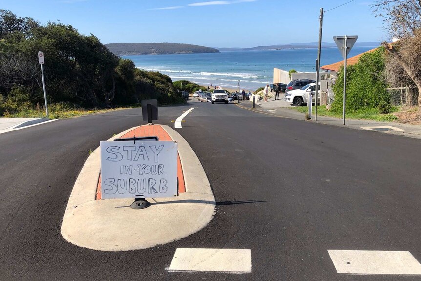A sign at Park Beach, Dodges Ferry, urging people to stay away.