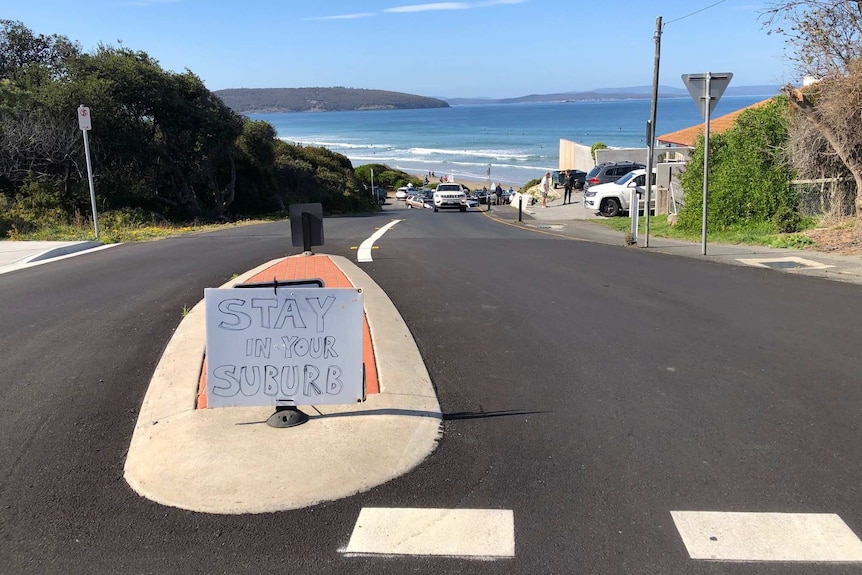 A sign at Park Beach, Dodges Ferry, urging people to stay away.