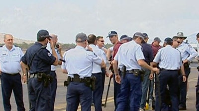 Qld police prepare to fly to Palm Island