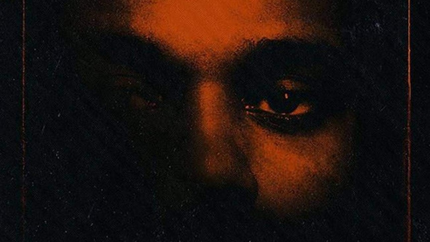 Moody black and red image of The Weeknd, as seen on the cover of his new album, My Dear Melancholy