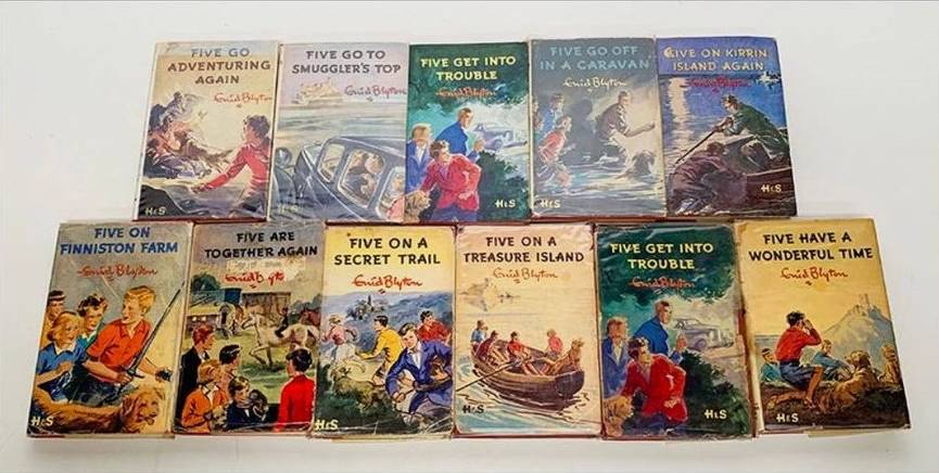 A display of Famous Five books with dust jackets that may not originals.