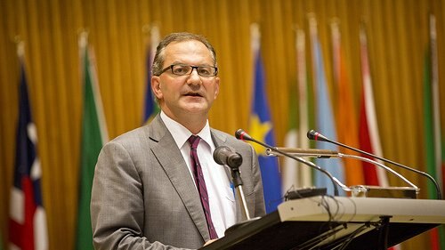 Peter Salama, Deputy Director General of the World Health Organization, speaking at a lectern