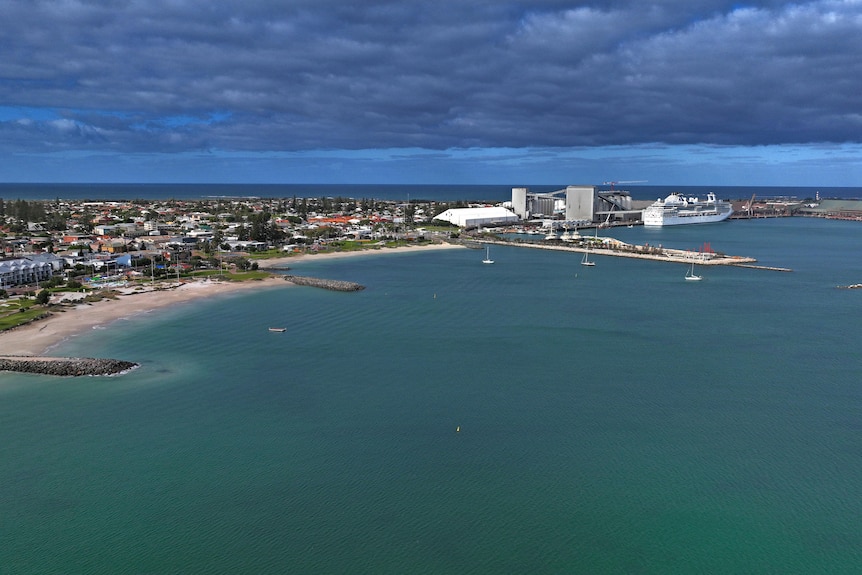 A port city, as photographed from the distance and across a bay