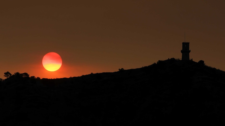 Sun sets over Mount Gambier