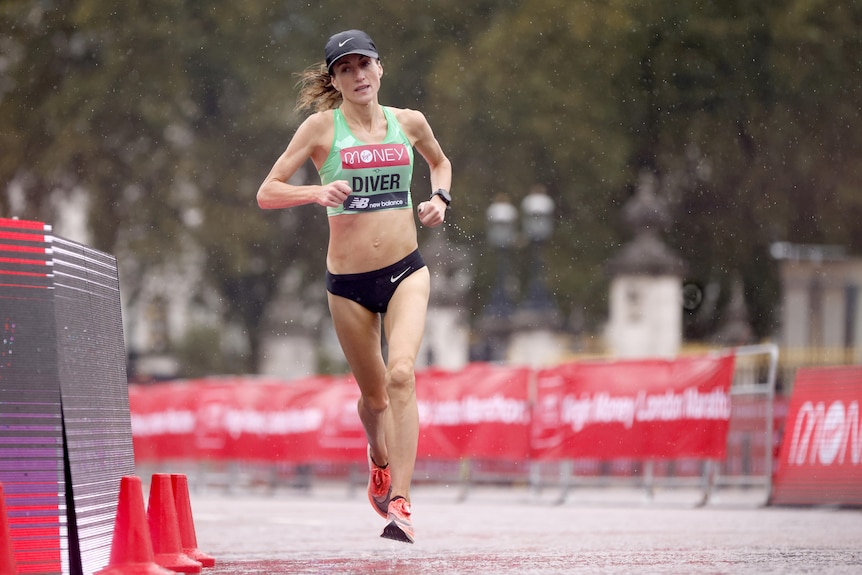 Sinead Diver runs alone in the rain