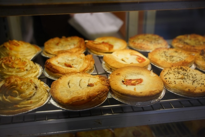 Selection of freshly baked meat pies in bakery