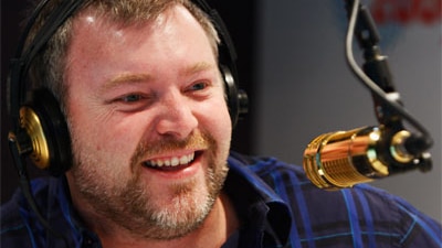Kyle Sandilands at the microphone of his radio show