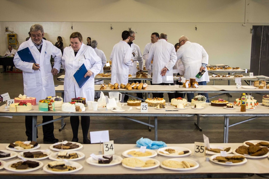 Judges  look over the hundreds of entries come in to the Perth Royal Bread and Pastry Awards