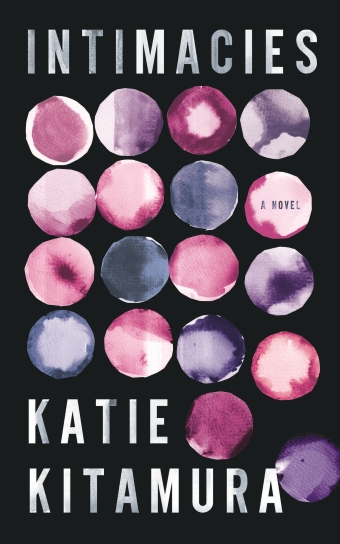 The book cover of Intimacies by Katie Kitamura, black background with purple and pink ink blots