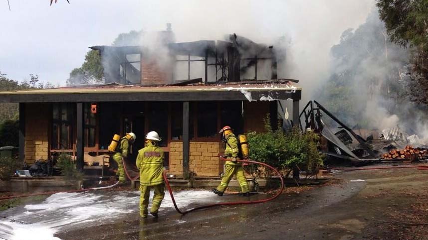Tasmanian Fire Service extinguishes a fire at a house on Old Bernies Road Margate.