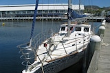 The 16-metre yacht was sinking off Sandy Bay when police arrived to investigate.