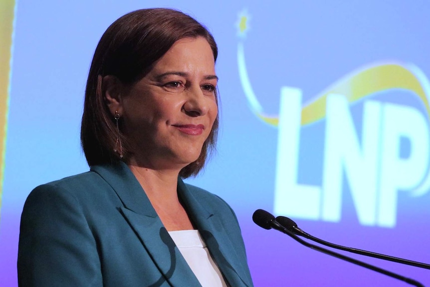 LNP leader Deb Frecklington at a podium delivering a speech at the LNP official election campaign launch.