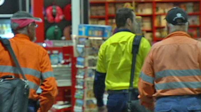 FIFO workers inside Perth airport terminal