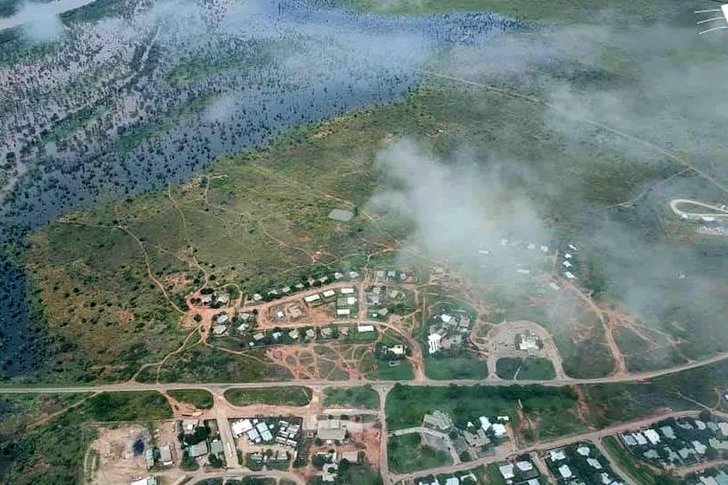 An aerial photo of Fitzroy Crossing surrounded by water.