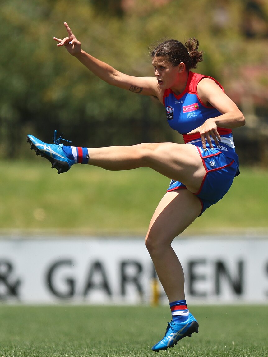Nell Morris-Dalton of the Bulldogs kicks the ball during an AFLW practice match against North melbourne