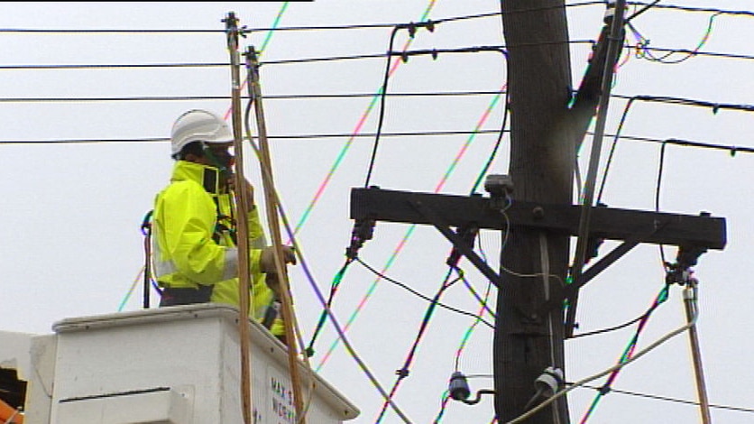 The man was restoring power lost in the storms yesterday. (File photo)