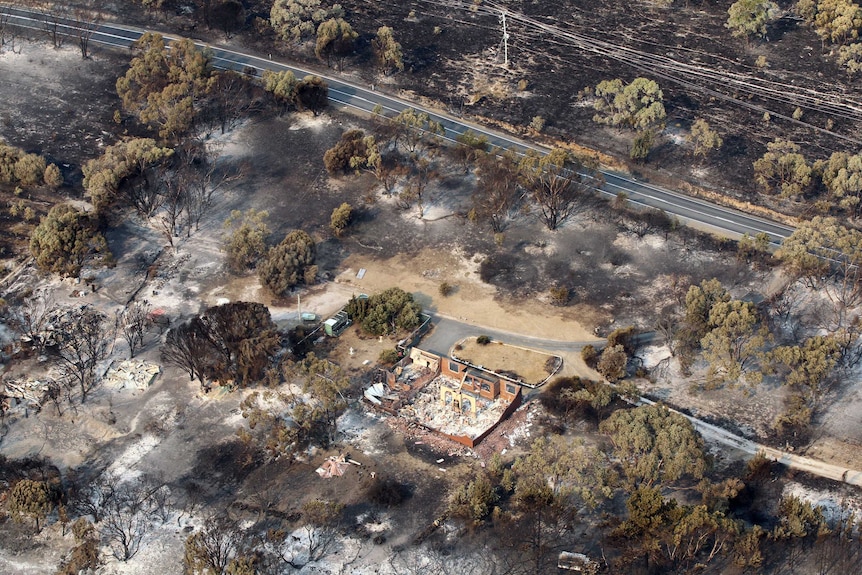 Devastation to property between Dunalley and Boomer Bay in Tasmania after bush fires swept through the area in 2013