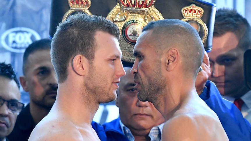 Jeff Horn (L) and Anthony Mundine (R) are seen after the weigh in for their bout at Lang Park.