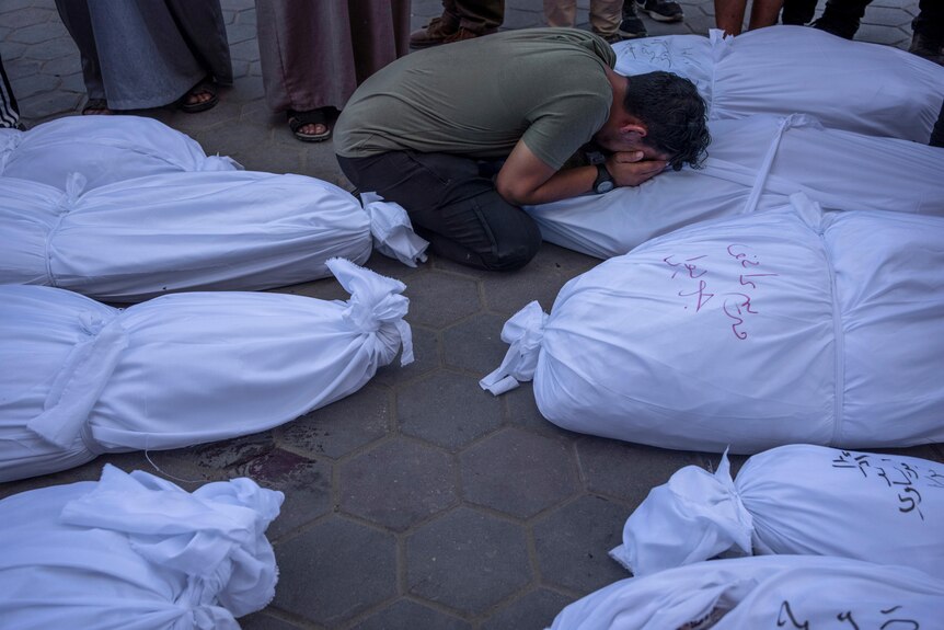 Palestinians mourn relatives killed in the Israeli bombardment of the Gaza Strip.