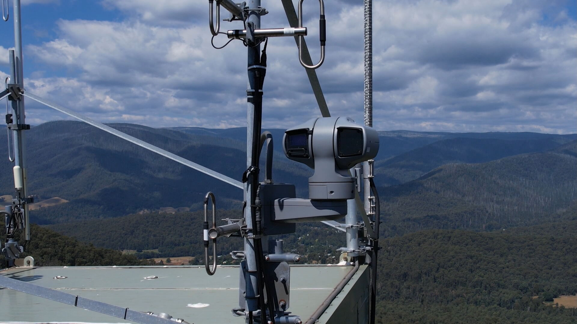 an aerial view of an ai operated camera on a fire tower