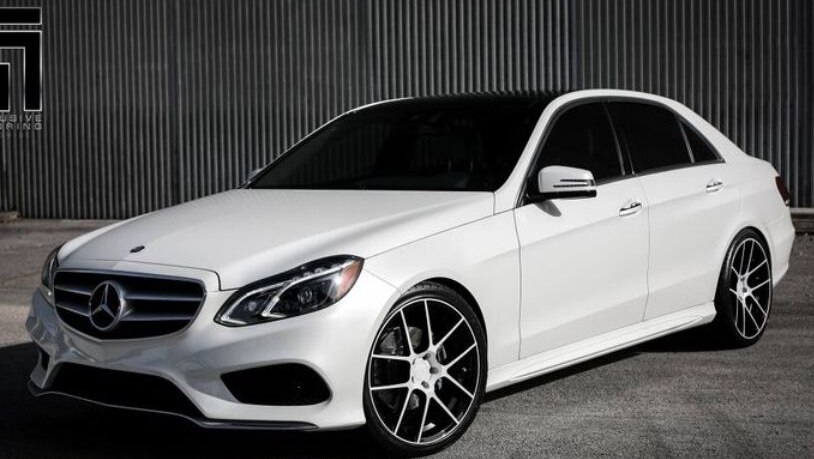 A picture of a white Mercedes sedan