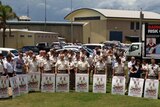Prison officers hold signs outside Hakea prison (file)