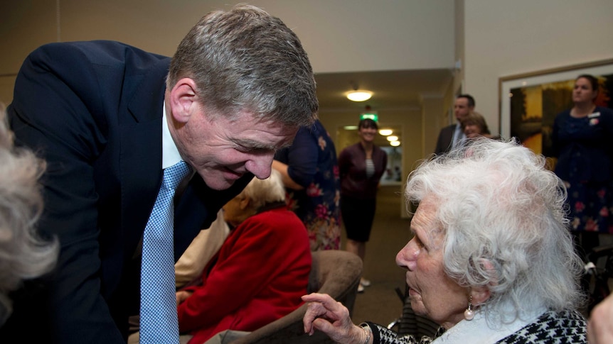 Bill English visits an elderly retirement home.