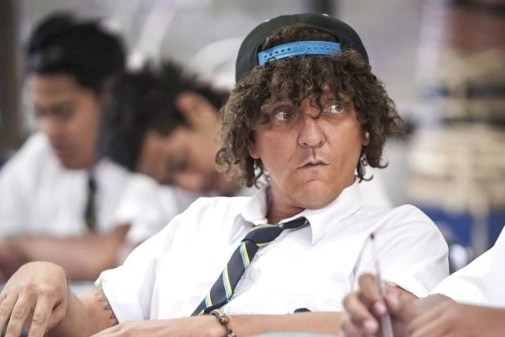 A scene from the mockumentary series Jonah From Tonga featuring Chris Lilley in brownface