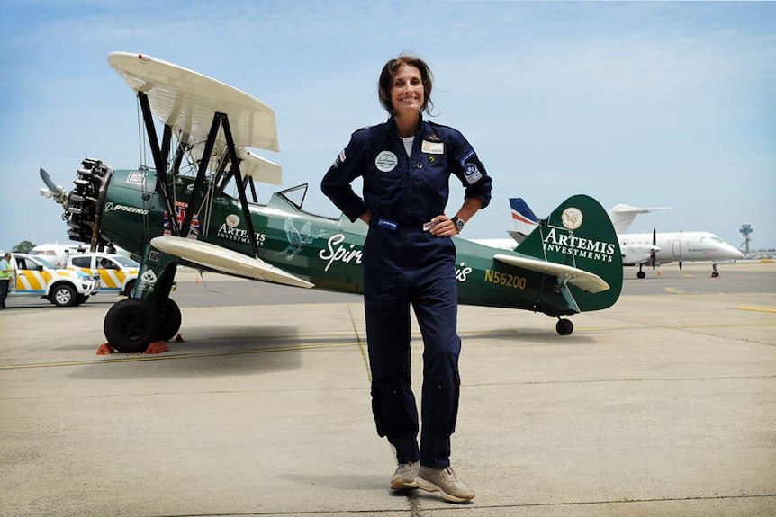 British aviatrix Tracey Curtis-Taylor poses in front of her plane, the Spirit of Artemis.