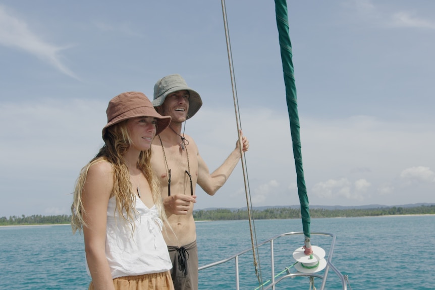 Torren Martyn and Aiyana Powell standing together on Calypte looking out at the ocean.