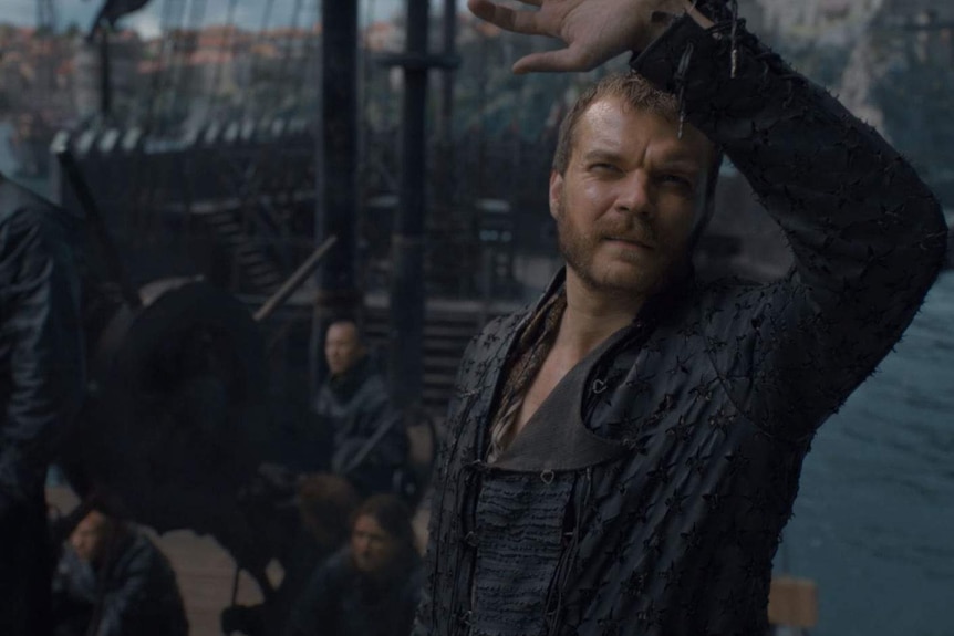 Euron looks at something in the sky.