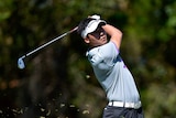 Zhang Xin Jun of China plays a shot during round two of the Australian PGA Championship.