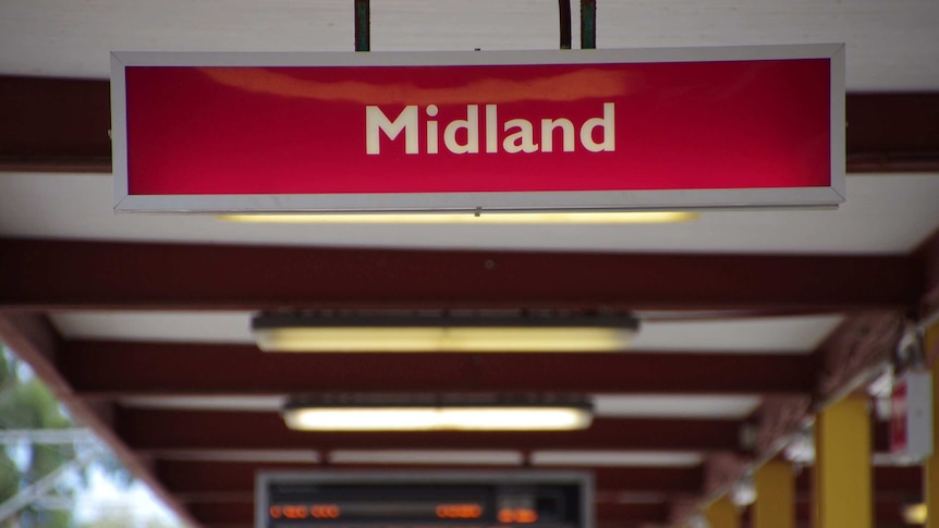 Midland sign at train station.