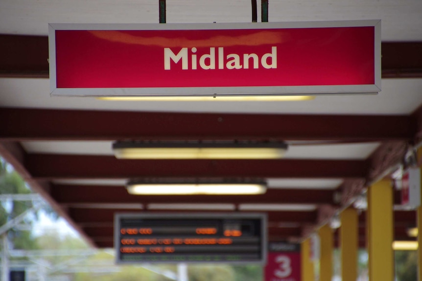 Midland sign at train station.