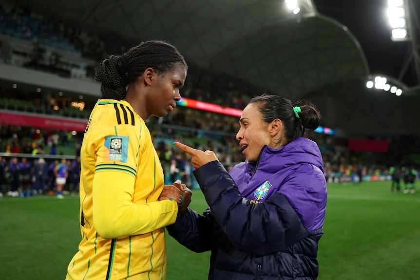 Brazil's Marta points to Jamaica captain Khadija Shaw after a game at the FIFA Women's World Cup.