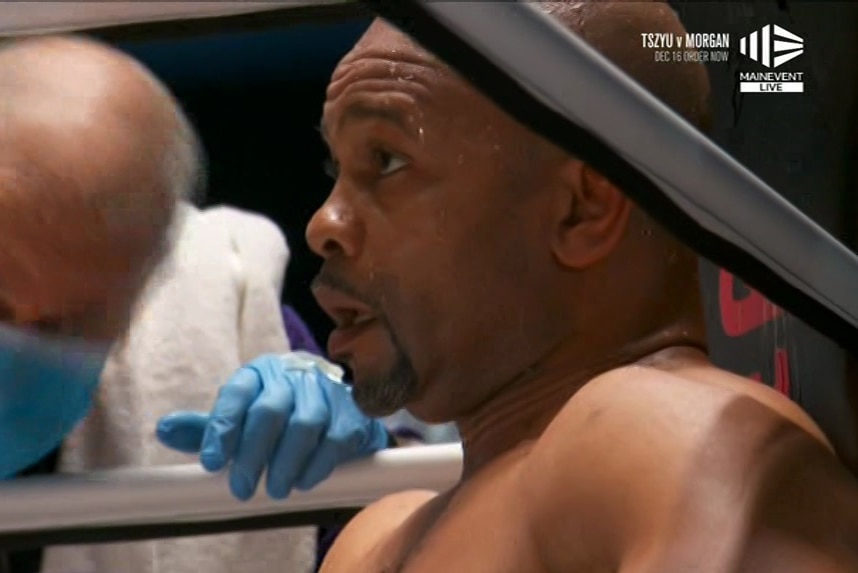 A sweaty Roy Jones Jr sits in his corner during an exhibition fight against Mike Tyson.