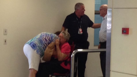 Parents Irene and George Burrows arrive at Brisbane airport